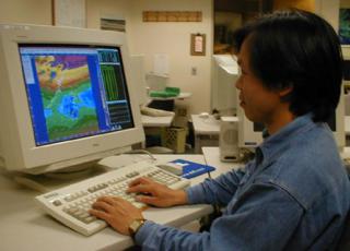 Ching-Huei Hsu (Jeff ), a visiting engineer from the CAA in Taipei,  working on the AOAWS MDS display at the Boulder lab.